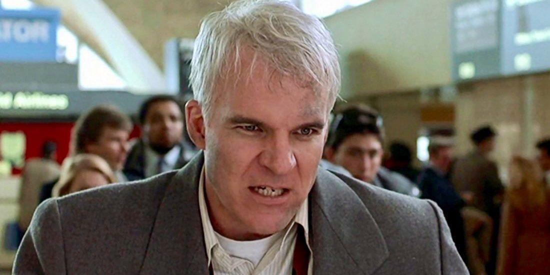 Steve Martin looking furious in Planes, Trains and Automobiles