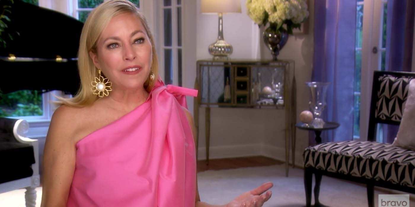 Sutton Stracke on The Real Housewives of Beverly Hills in pink dress talking to cameras