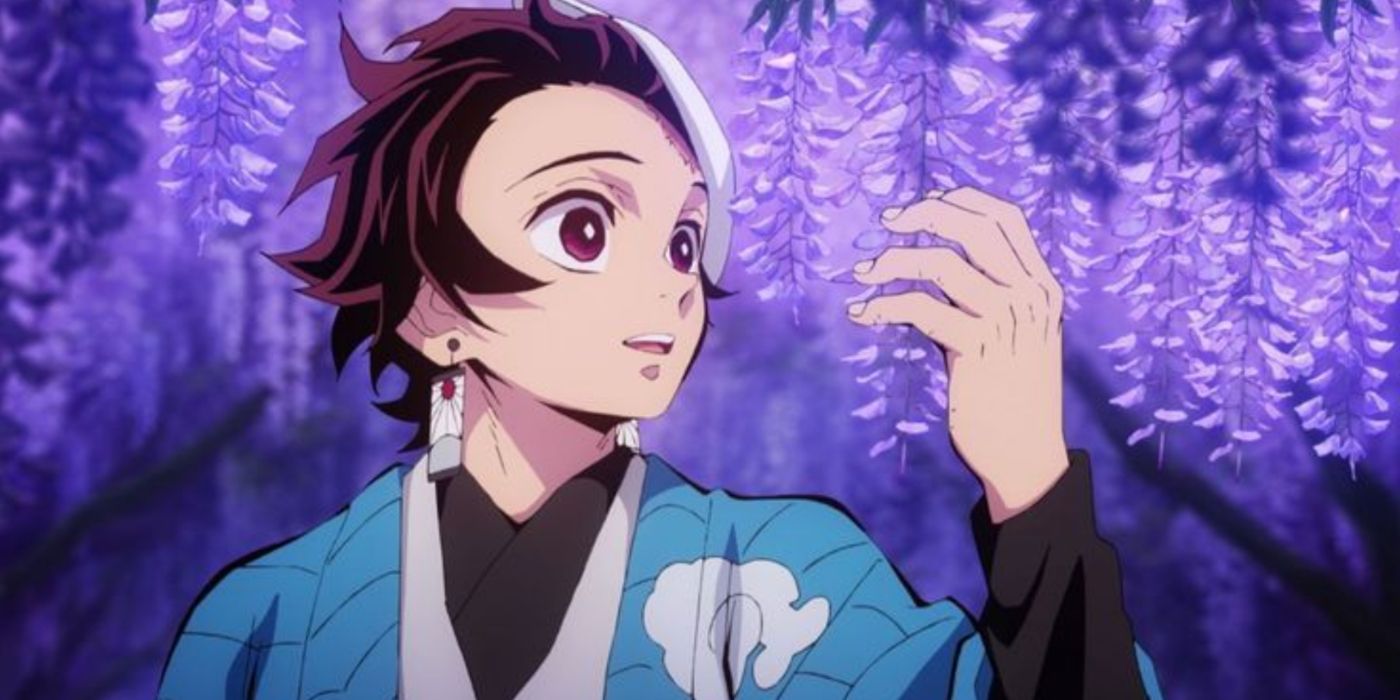 Tanjiro in a forest surrounded by vibrant purple leaves in Demon Slayer.