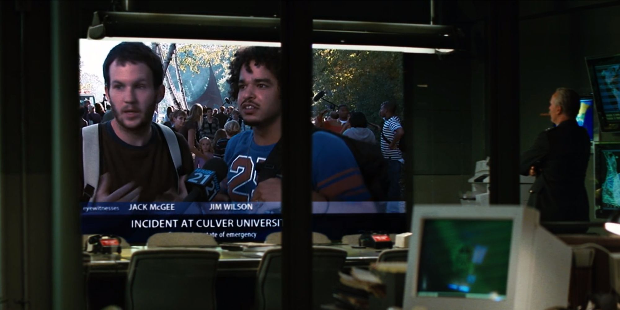 Thaddeus Ross watching an interview with Jack McGee and Jim Wilson in The Incredible Hulk (2008)