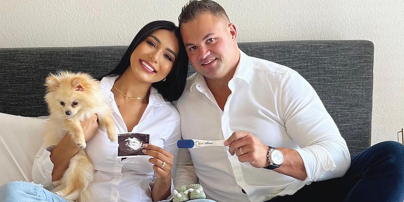 Thaís Ramone and Patrick Mendes from 90 Day Fiancé showing baby sonogram and pregnancy test with Thais holding pet dog