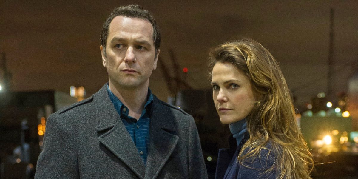 A man and woman look on in The Americans 