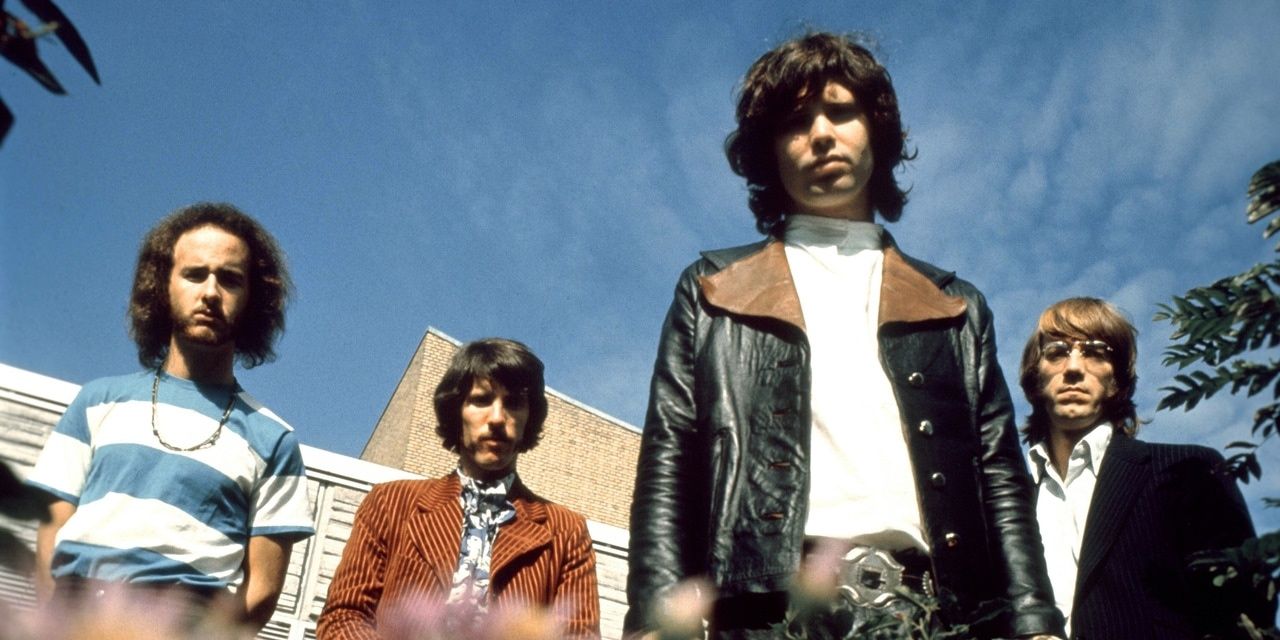 The Doors standing together outside.