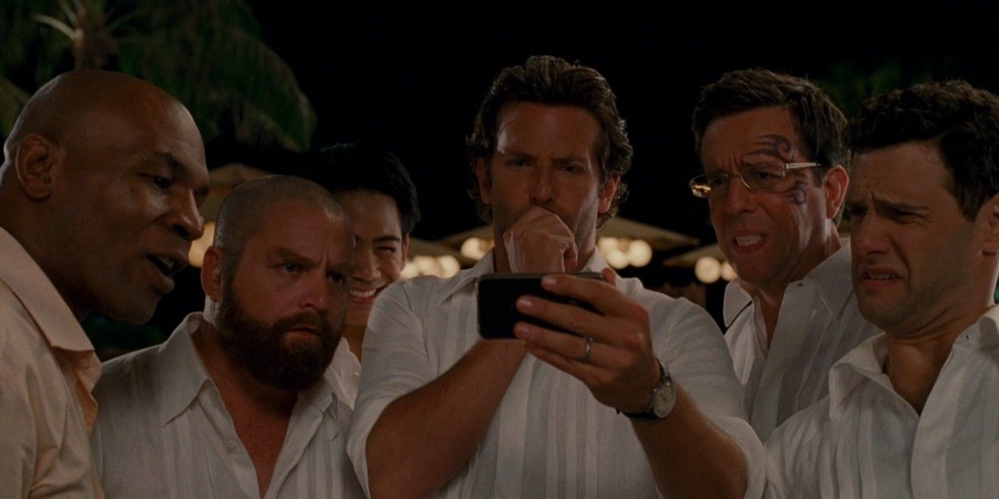 The gang look at last night's photos in Hangover Part 2