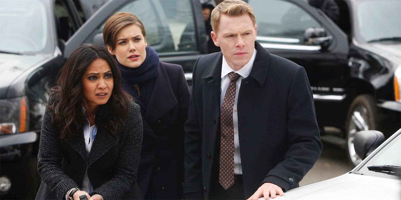 The Blacklist Donald Meera and Liz standing by cars looking concerned 