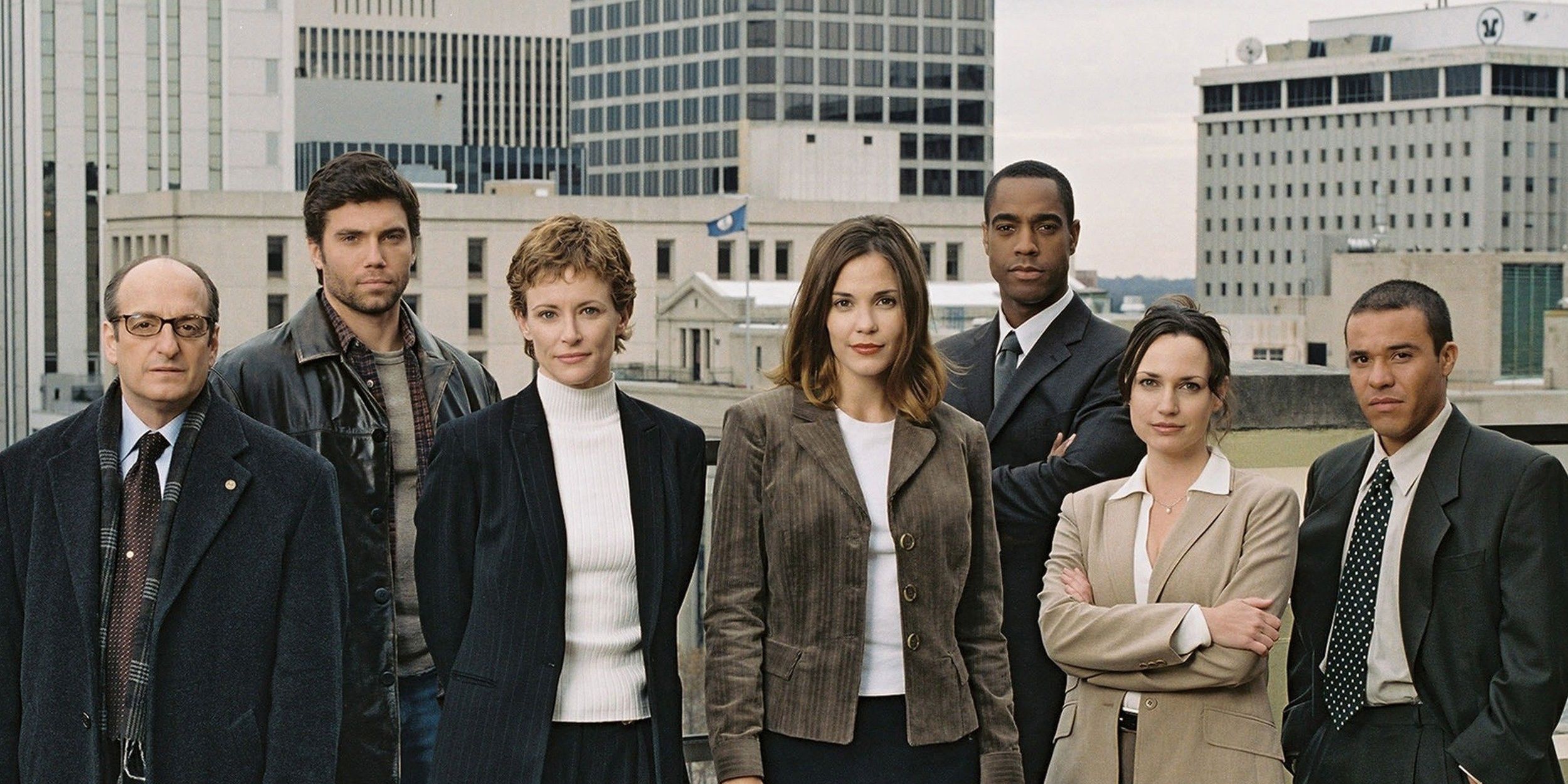 The cast of the television show Line of Fire including a young Anson Mount