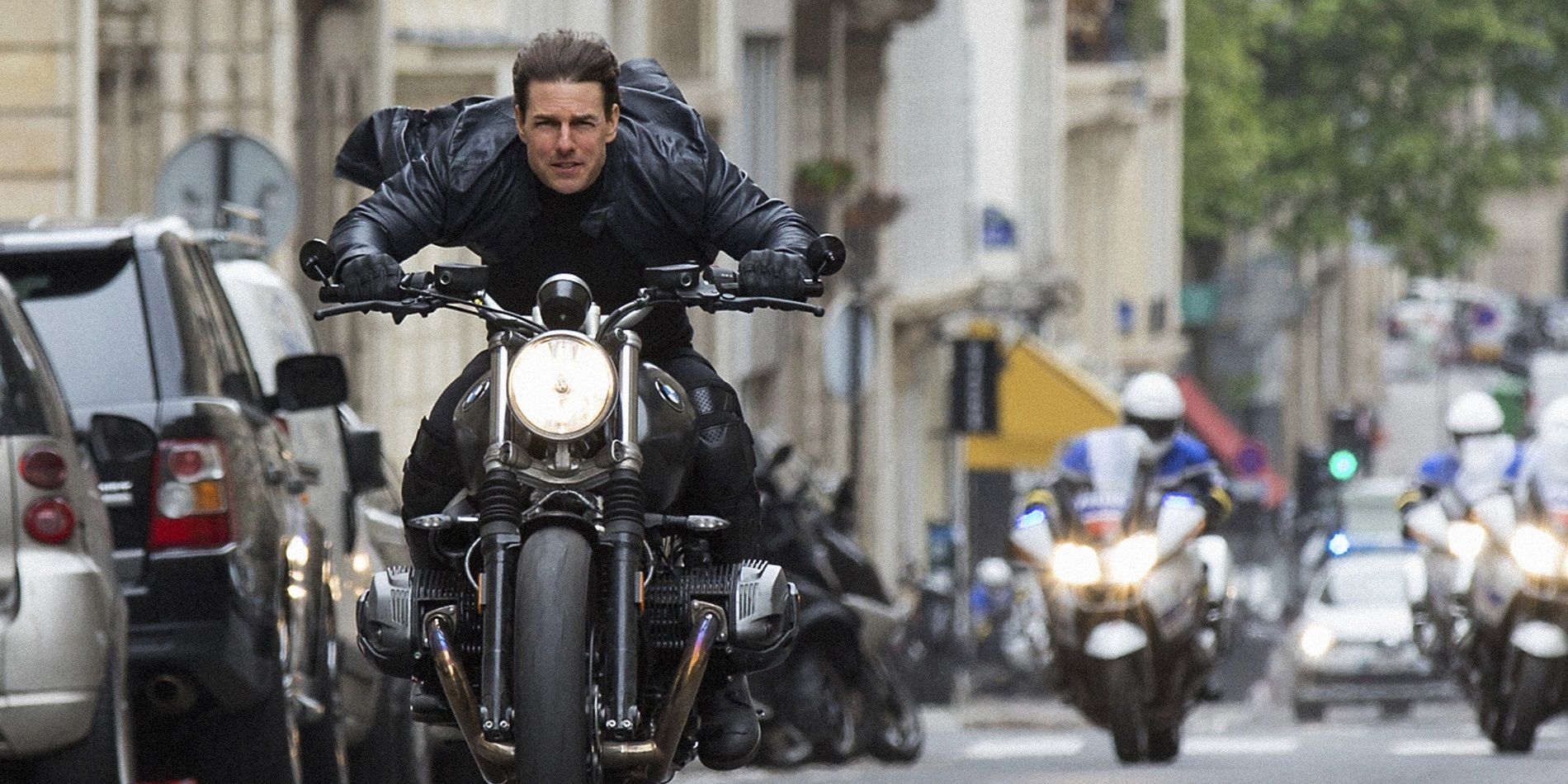 Tom Cruise as Ethan Hunt on a motorcycle in Mission Impossible Fallout