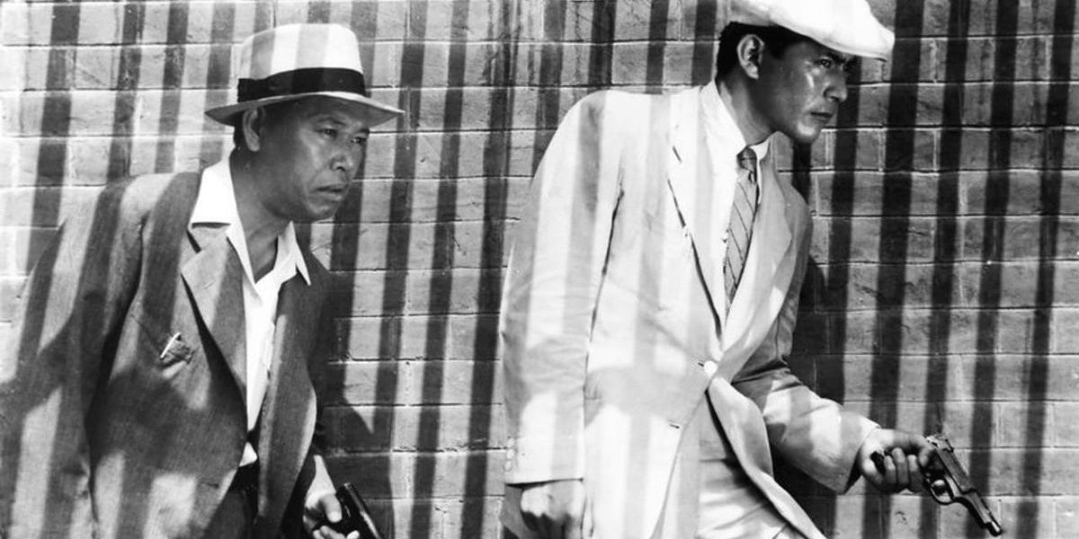 Two cops with guns in Akira Kurosawa's Stray Dog