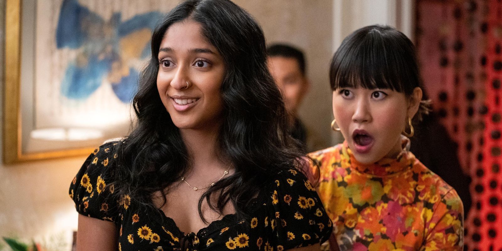 Eleanor looks shocked next to Devi who smirks