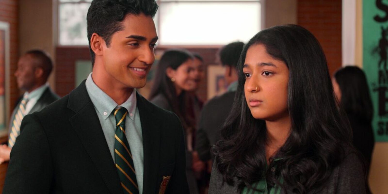 Des smiles while Devi looks disappointed
