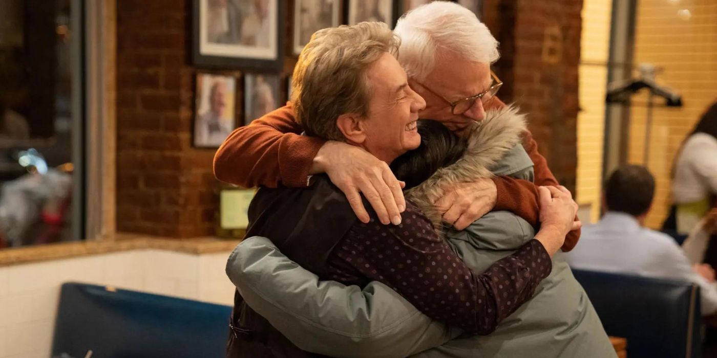 Charles, Oliver and Mabel hug in Only Murders In The Building.