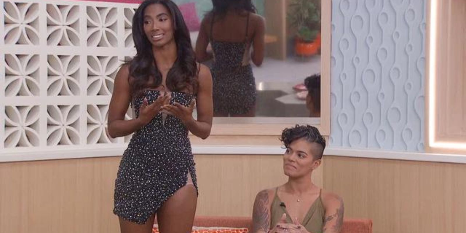 Taylor Hale stands to say her speech against Nicole