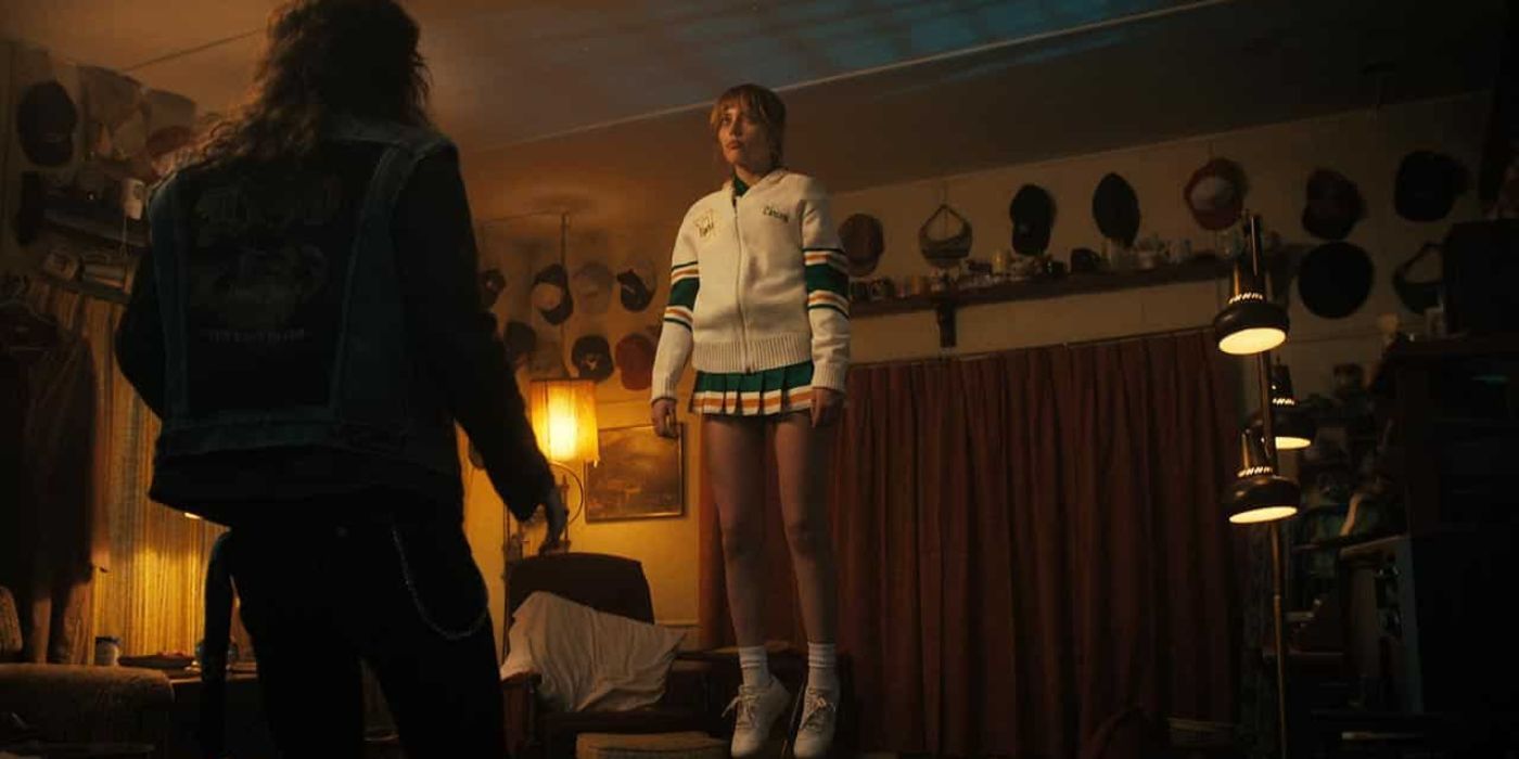 Eddies looks at Chrissy hovering in Stranger Things.