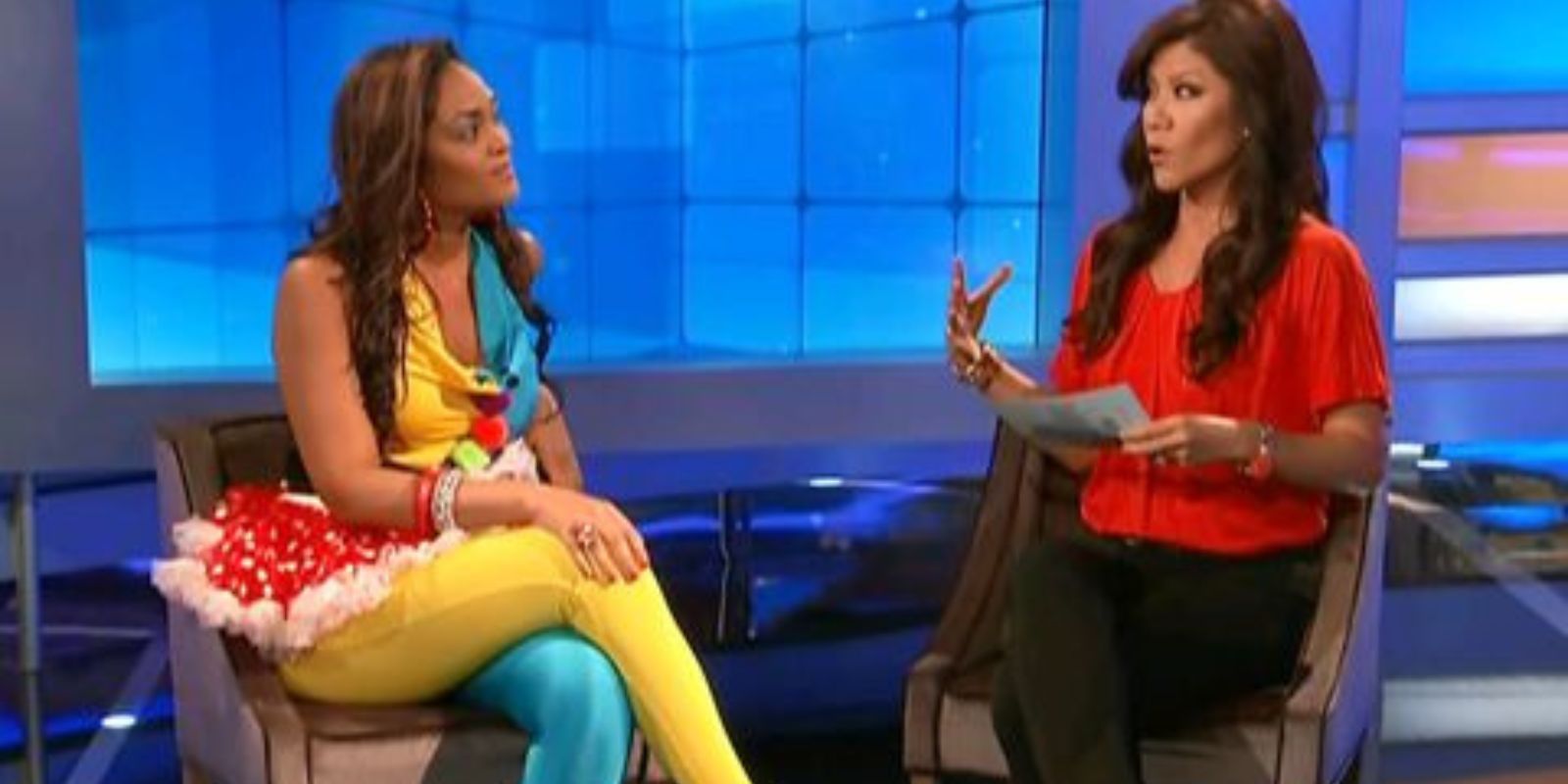 Candice sits with Julie on her eviction night wearing clowntard