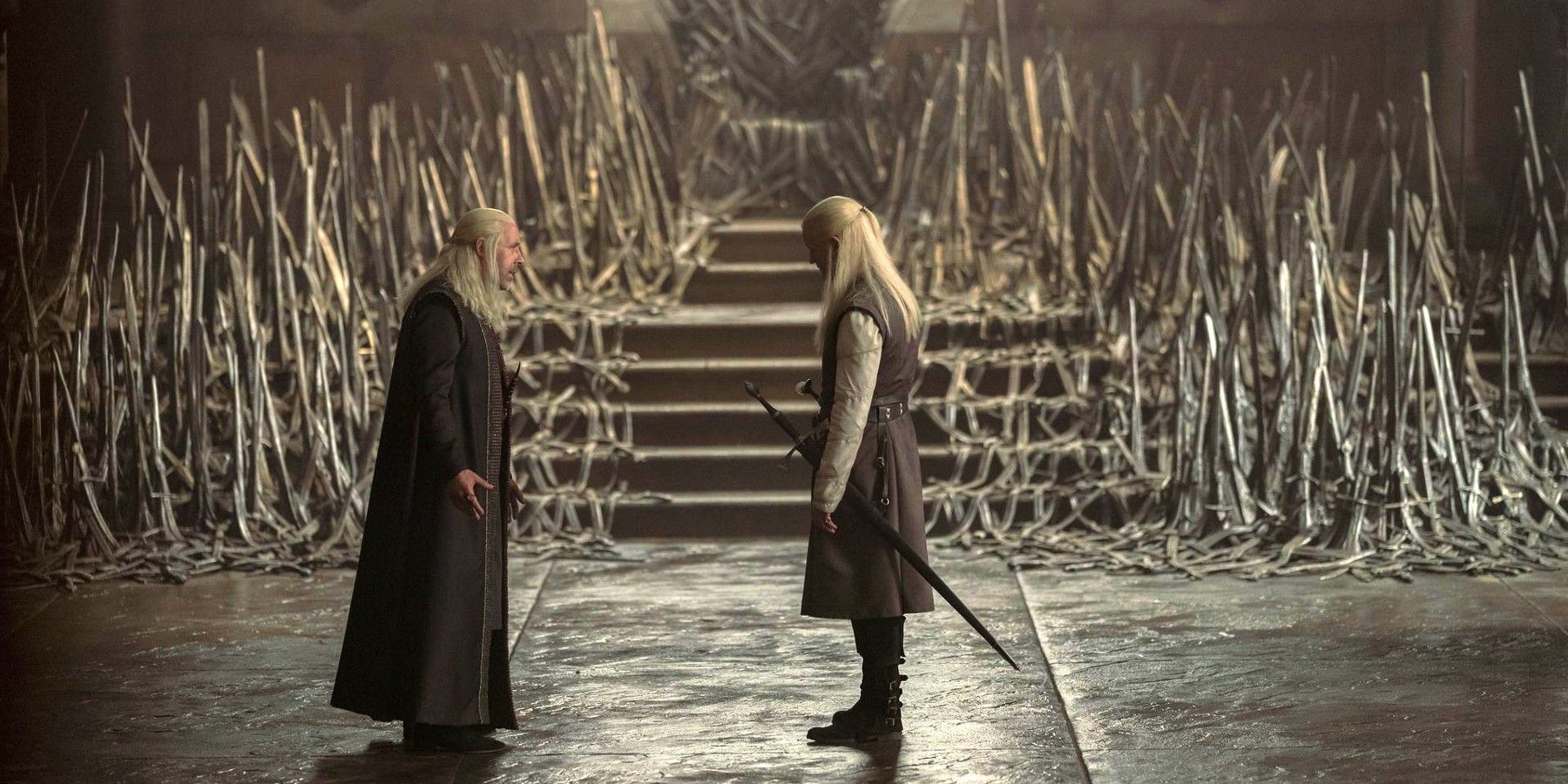 Viserys and Daemon Targaryen standing in front of the Iron Throne on House of the Dragon