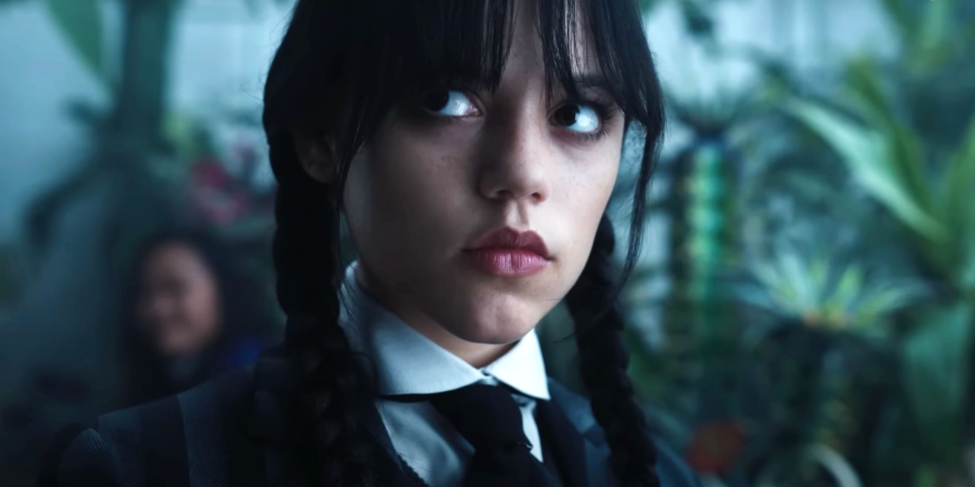 Jenna Ortega looking serious in Wednesday