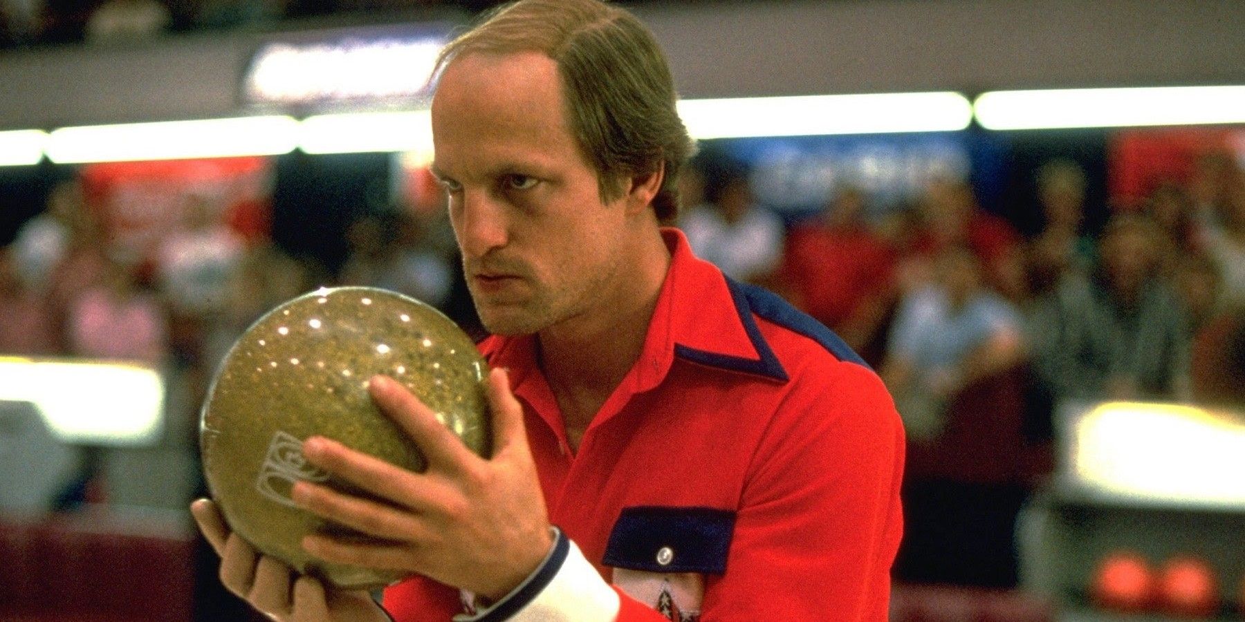 Woody Harrelson holding a bowling ball in Kingpin