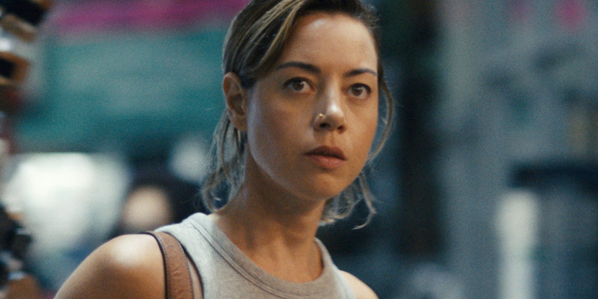 Aubrey Plaza looking worried in Emily the Criminal