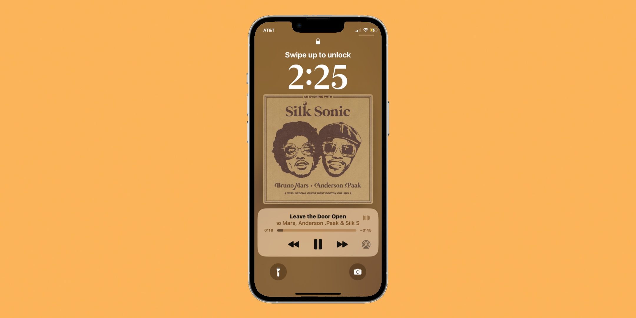 iOS 16's full-screen Music Player on an iPhone lock screen.