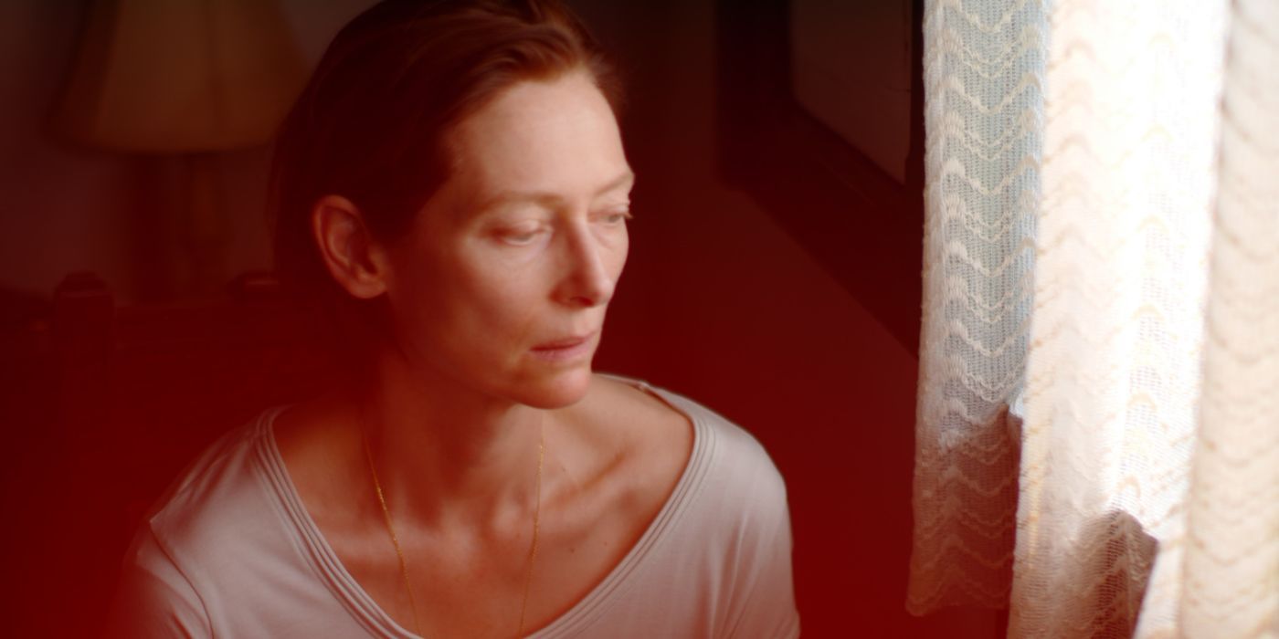 Tilda Swinton looking out the window