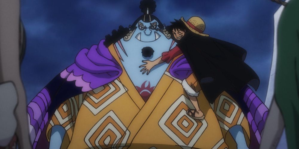 Luffy hugs Jinbe on One Piece