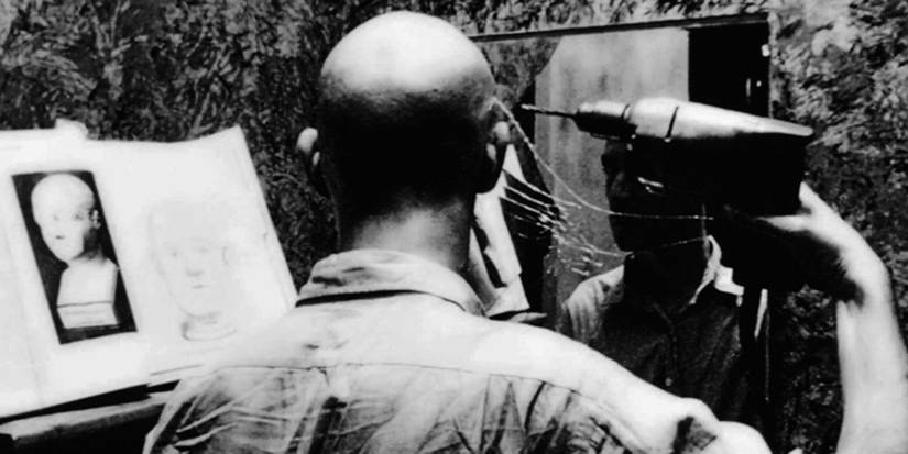 A man about to drill a hole in his head in Pi
