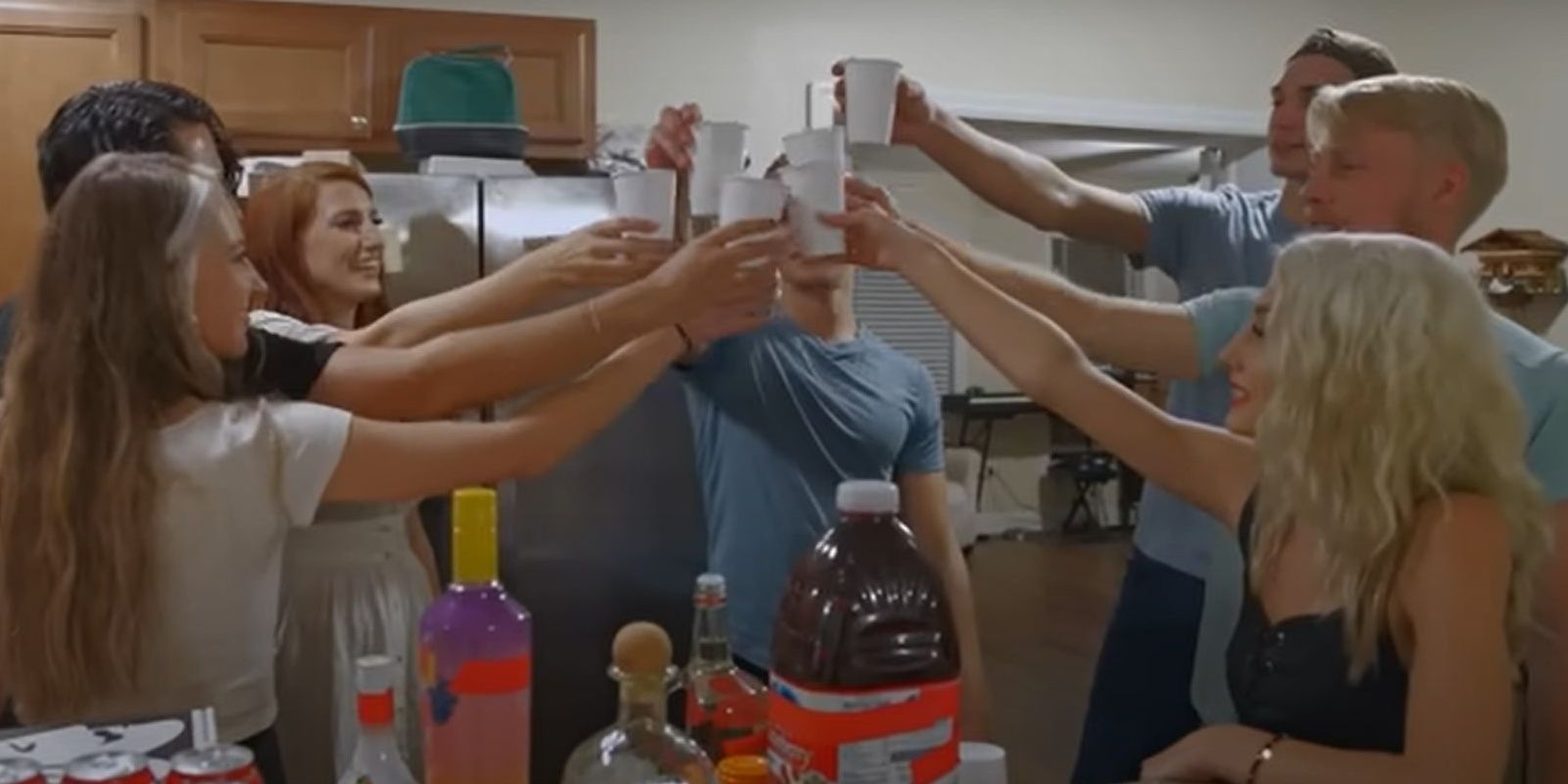 Nathan Meggs Ethan Plath Moriah Plath Olivia Plath Micah Plath Welcome to Plathville toasting each other in kitchen