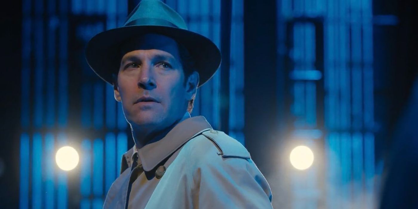 Paul Rudd as Ben in Only Murders in the Building, staring intently in a blue light.