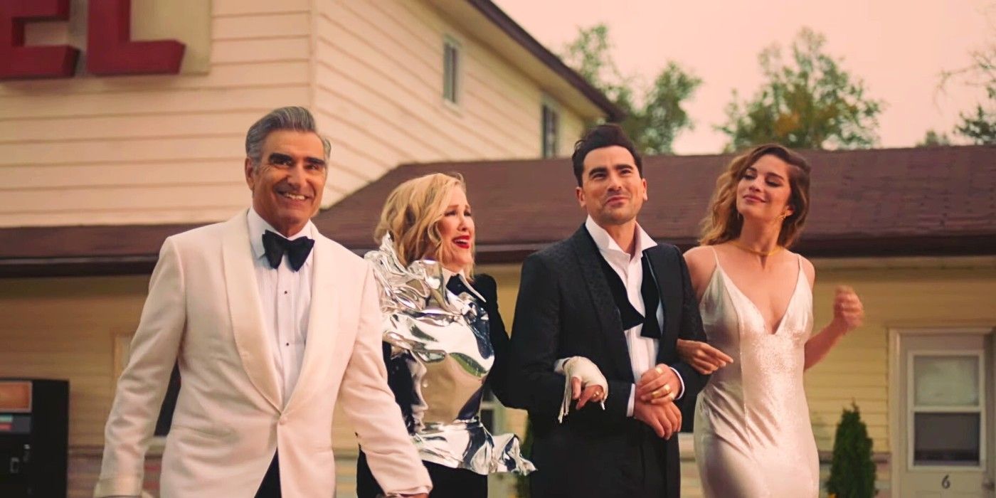 schitt's creek season 6 promo screencap featuring the Roses walking together in front of a motel