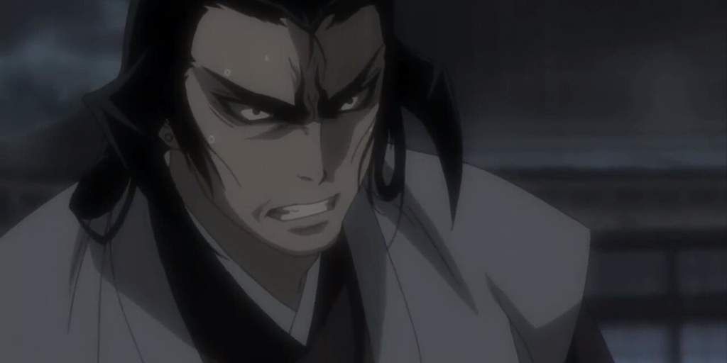 Tenzen Yakushiji glaring offscreen during a nighttime battle in Basilisk.