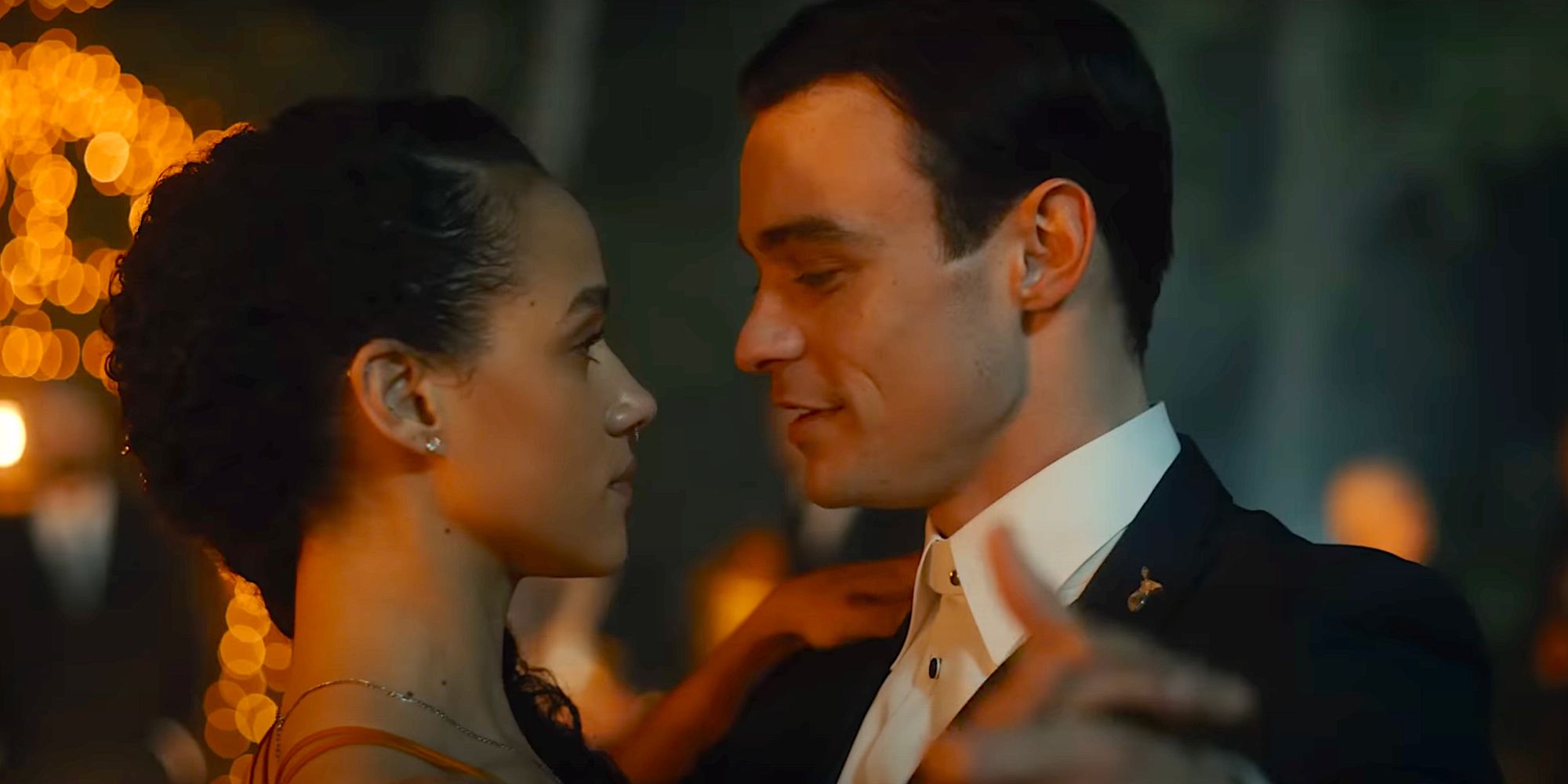 Nathalie Emmanuel as Evie and Thomas Doherty as Walt dancing in 2022's The Invitation