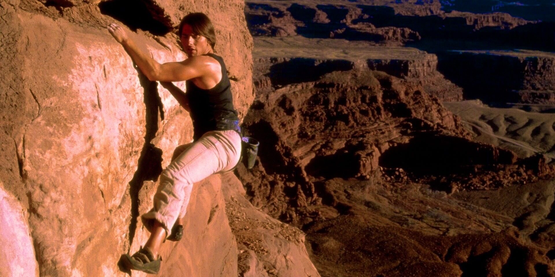 tom cruise as ethan hunt rock climbing mission impossible 2