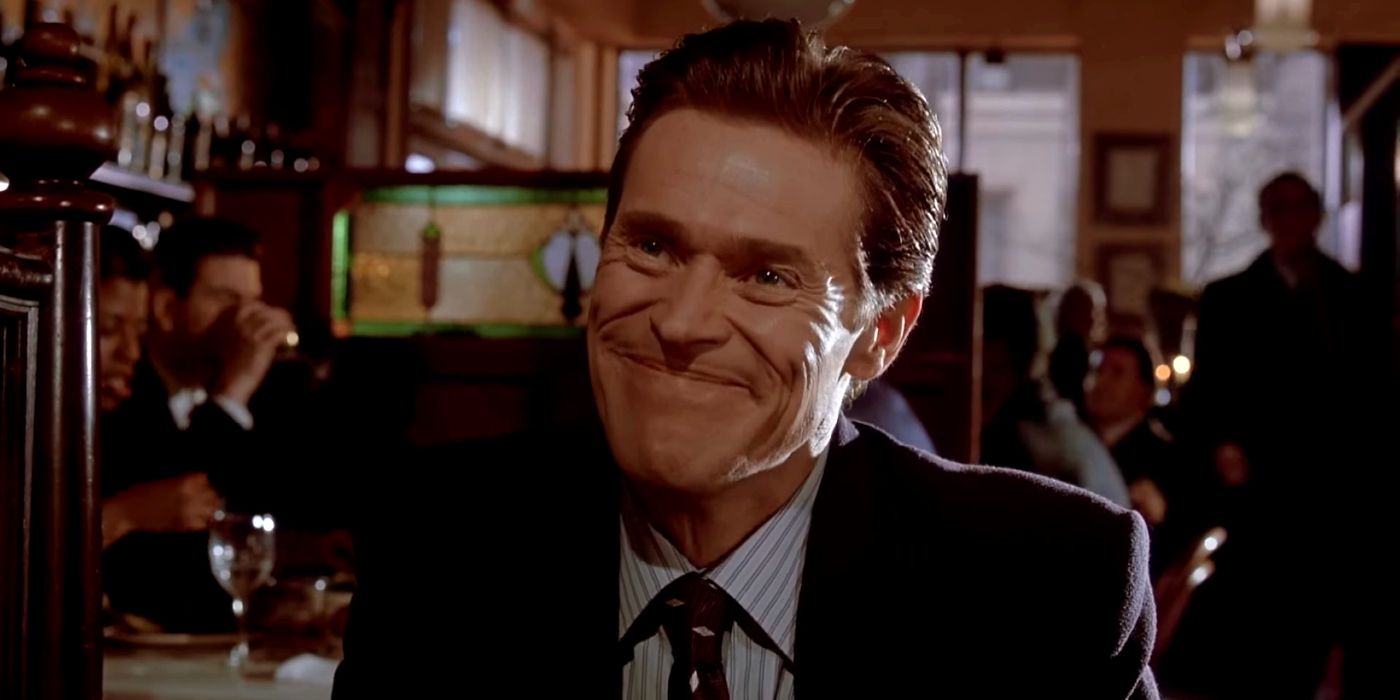 Willem Dafoe smiling as Donald Kimball in American Psycho.