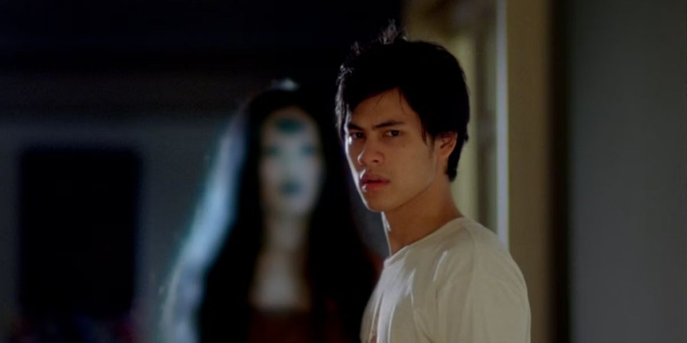 A scene from Ghost of Mae Nak with one character looking at the camera