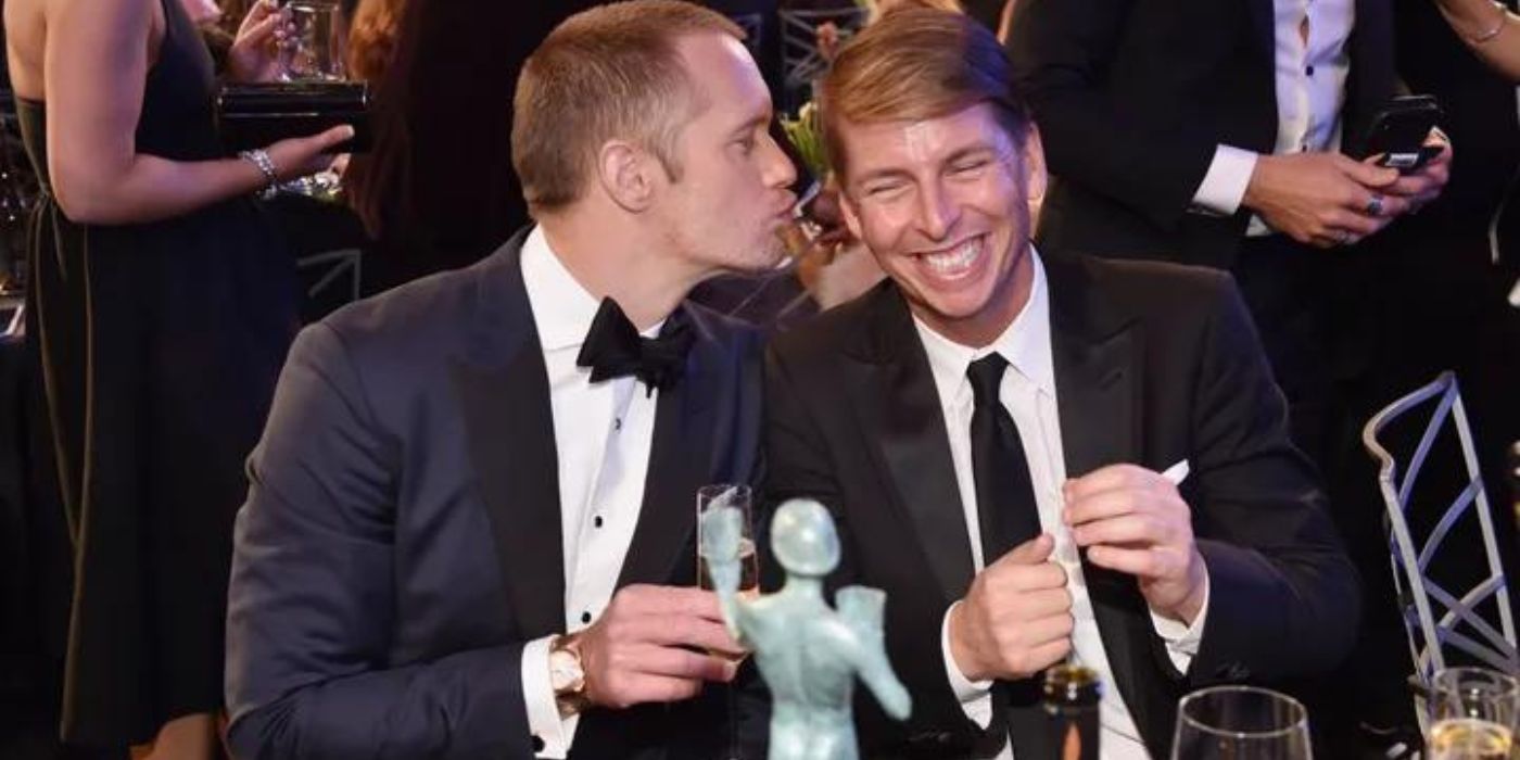 Alexander Skarsgard and Jack Macbrayer sitting and laughing together at the SAG Awards.