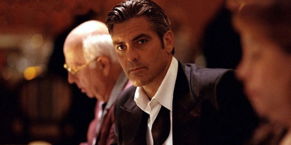An image of George Clooney looking at someone off-screen in Out of Sight