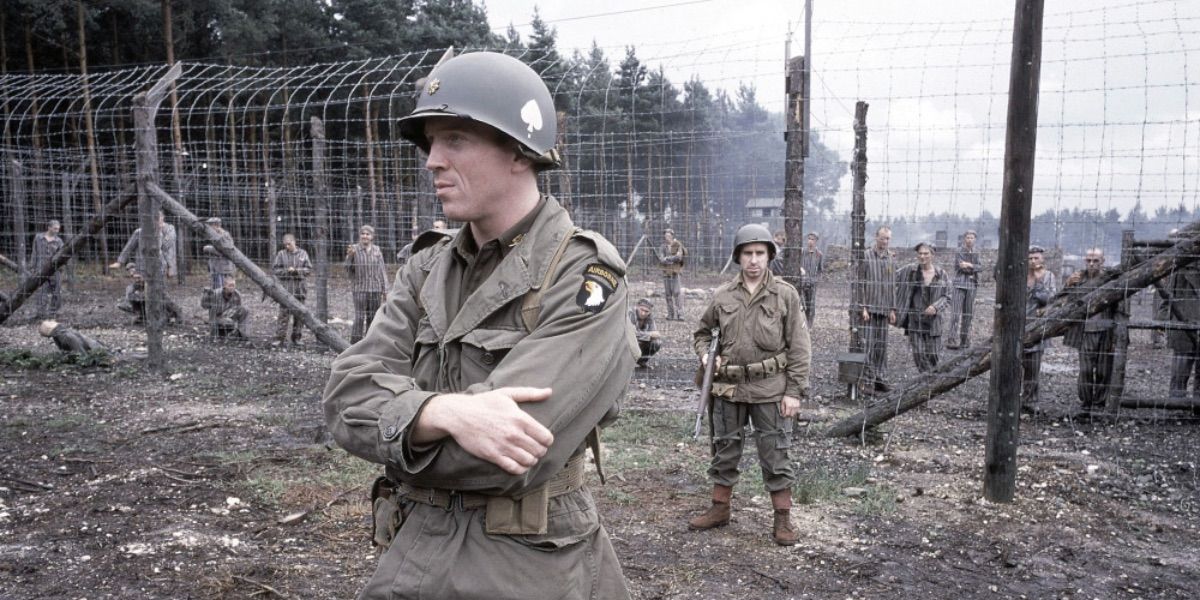 A soldier watches a Band of Brothers concentration camp 