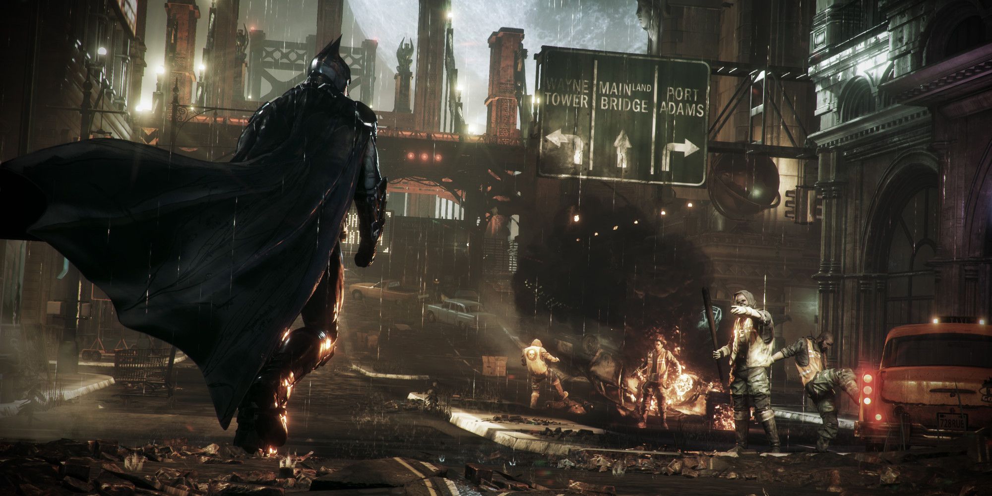 Batman caminhando em direção a um grupo de bandidos em Arkham Knight.
