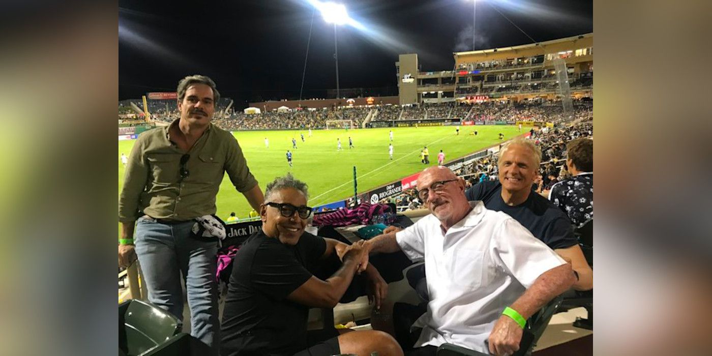 Better Call Saul actors Tony Dalton, Giancarlo Esposito, Jonathan Banks and Patrick Fabian are photographed in the stands at a soccer match.