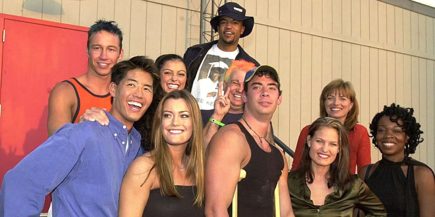 Big Brother Season 1 Cast outside of the house smiling 