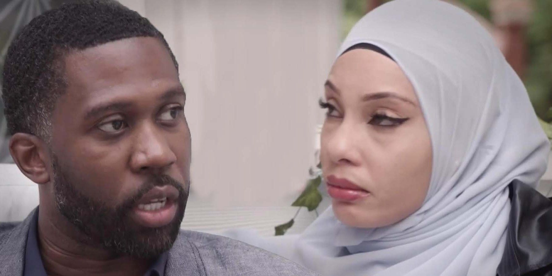 Bilal Hazziez and Shaeeda Sween from 90 Day Fiancé: Happily Ever After looking at each other with serious expressions