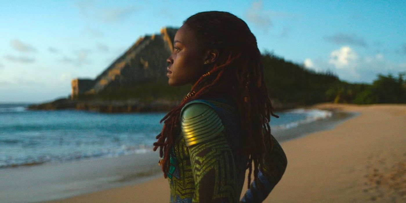Lupita Nyong'o as Nakia looking out at the ocean in Black Panther Wakanda Forever