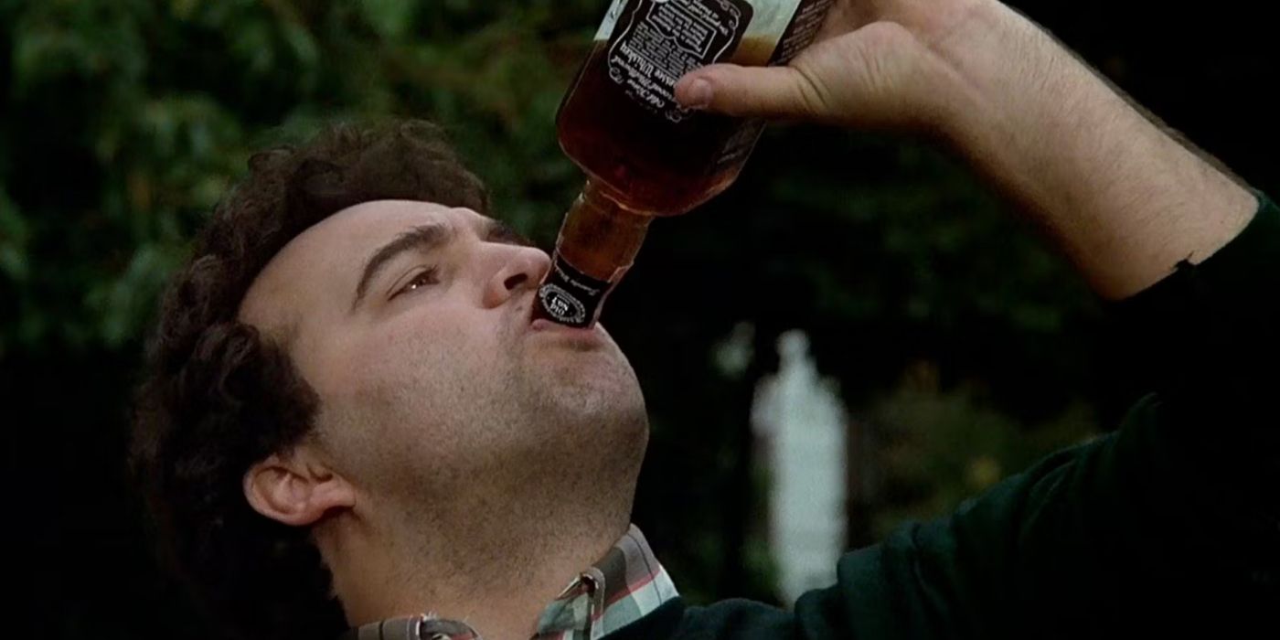 John Belushi as Bluto drinking Jack Daniels in National Lampoon's Animal House