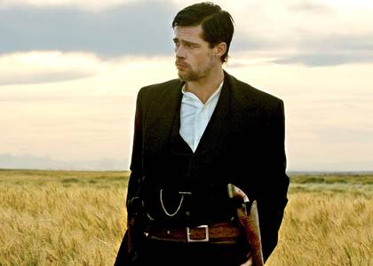 Brad Pitt stands in a field in The Assassination Of Jesse James By The Coward Robert Ford