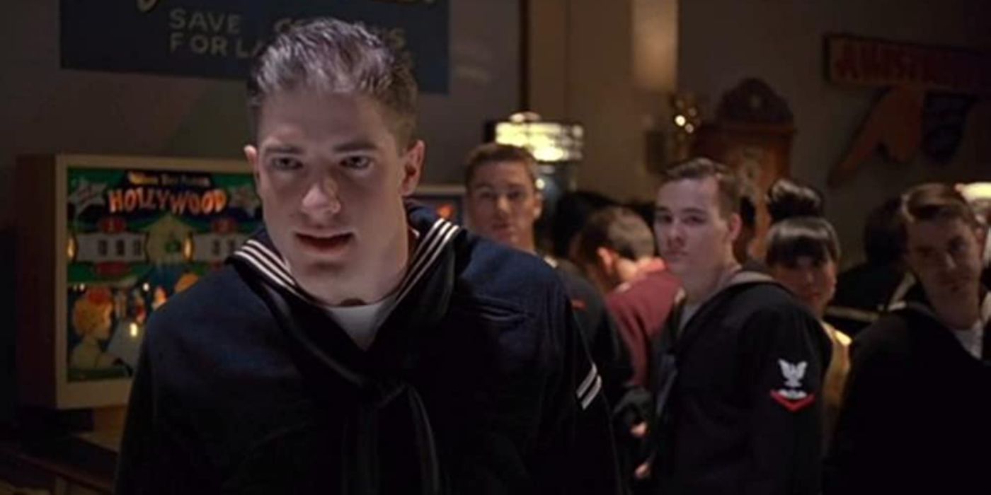 Brendan Fraser watches intently in Dogfight