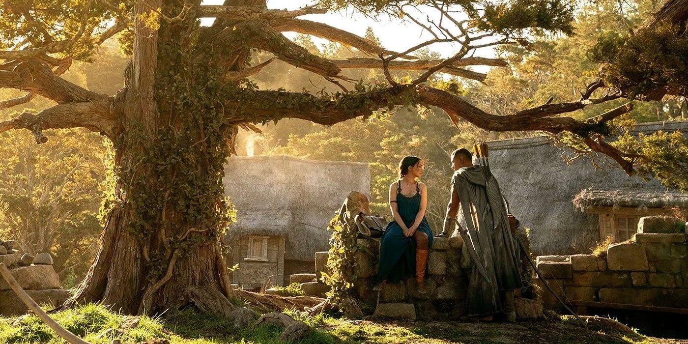 Bronwyn and Arondir by a well in Lord of the Rings The Rings of Power