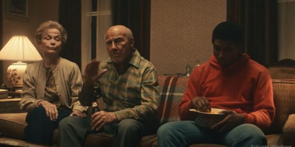 Camile watches TV with Cus and Tyson in Mike