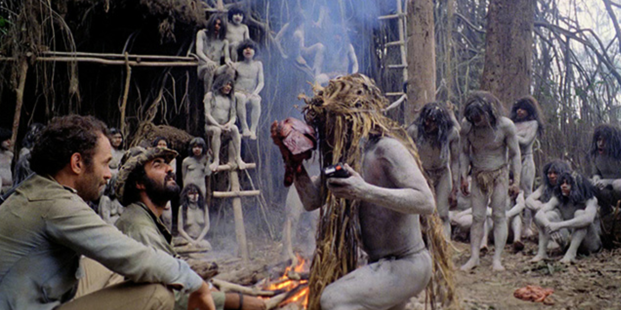 Documentary makers looking at a cannibal tribe&rsquo;s ritual in Cannibal Holocaust (1980)