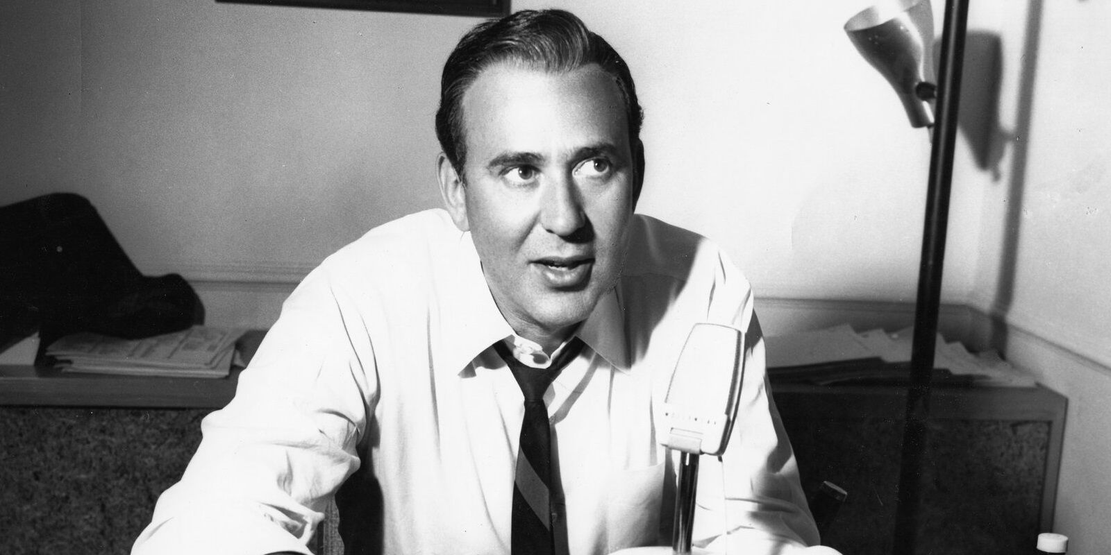 Carl Reiner sitting at his desk