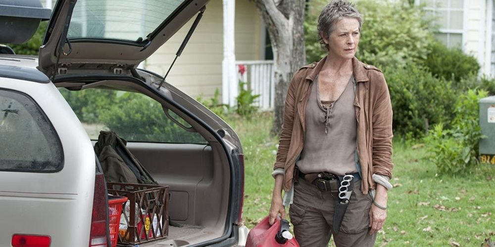 Carol standing by her car in The Walking Dead